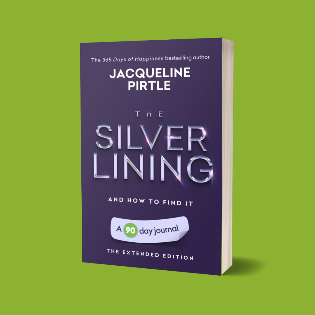 A book cover for 'The Silver Lining – And How to Find It' by Jacqueline Pirtle, which is a 90-day journal workbook in a hardcover format with a purple and blue cover.