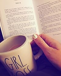 Interior pages of 365 Days of Happiness showing daily passages layout