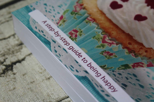 365 Days of Happiness paperback book cover featuring colorful design and title text