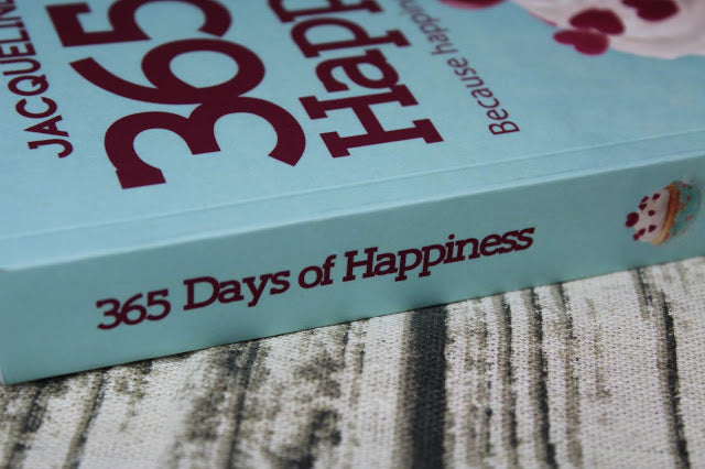365 Days of Happiness paperback book cover featuring colorful design and title text