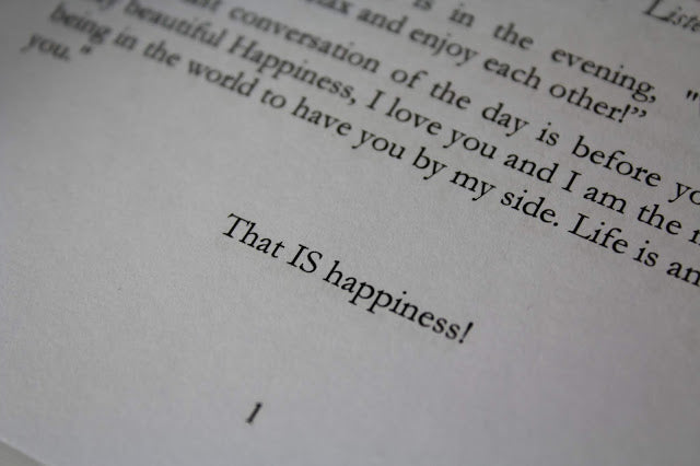 Interior pages of 365 Days of Happiness showing daily passages layout