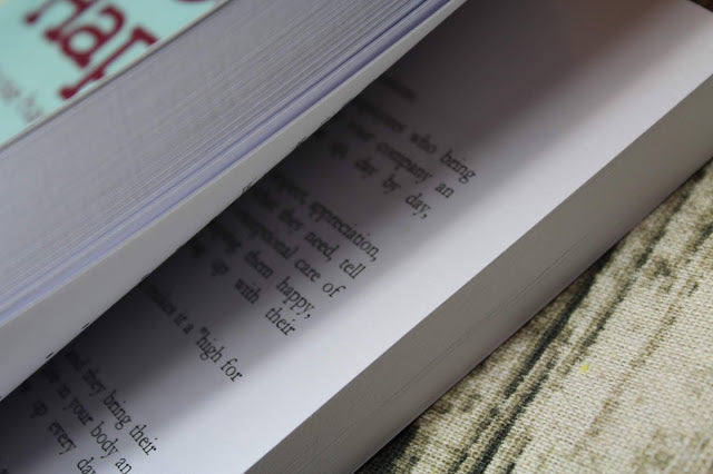 Interior pages of 365 Days of Happiness showing daily passages layout