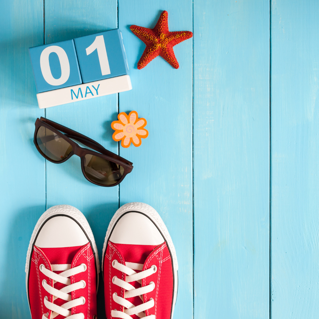 May 1 with red shoes, sunglasses, and beach decoration