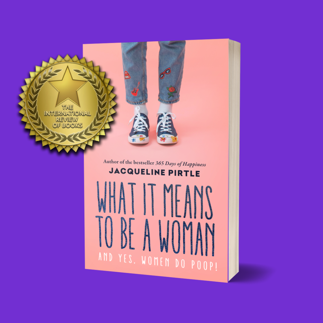 A paperback book titled 'What It Means to BE a Woman' by Jacqueline Pirtle, featuring an image of a woman's legs in jeans wearing sneakers, with a badge stating 'The International Bestseller'.
